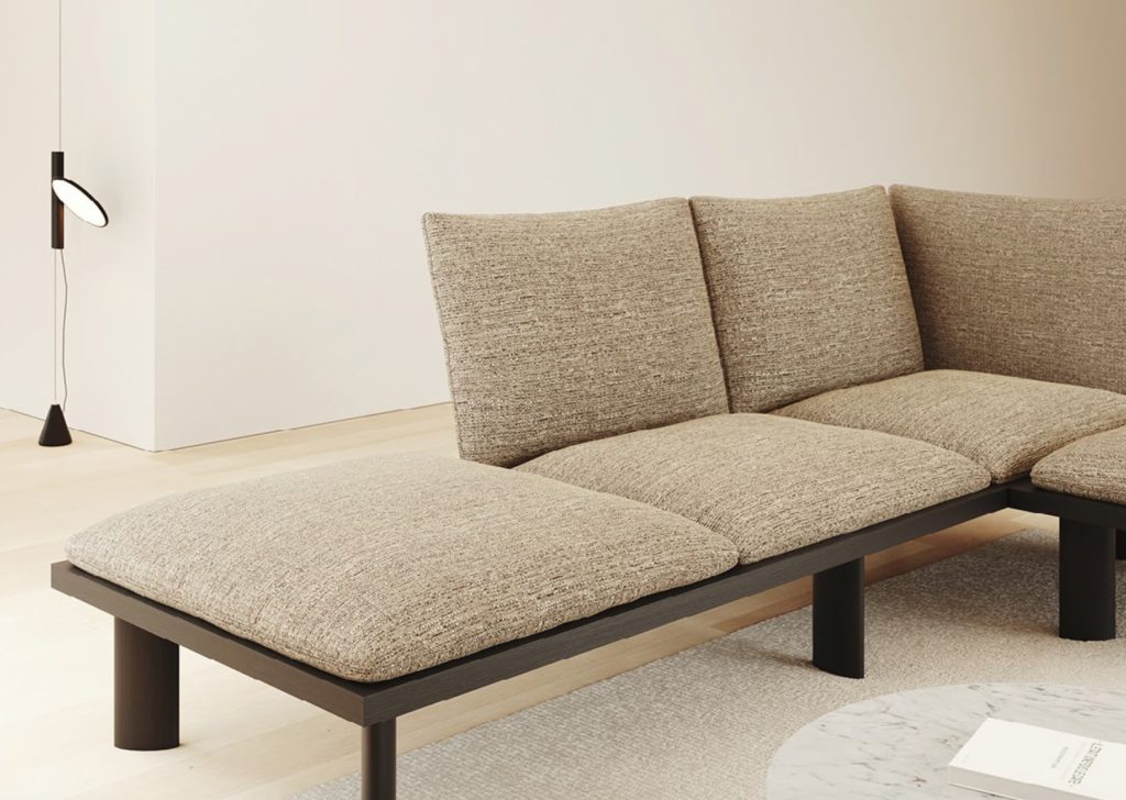 Plush grid textile from Drop 16 collection on modern sofa in light gray