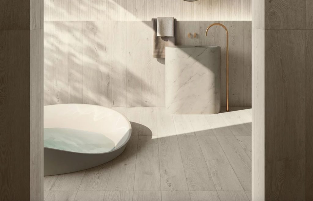 Nabi collection silver wide planks in bathroom with modern tub