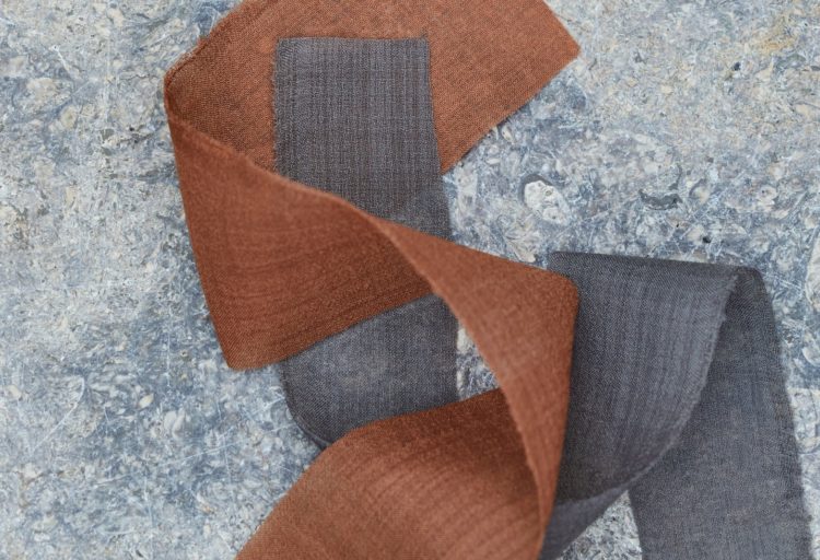 Carnegie new collection fabric swaths in charcoal and rust
