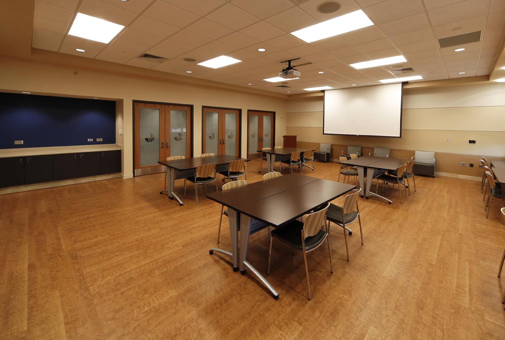An image showing an LVT floor by AHF Flooring in a classroom at Georgia State University Alpharetta