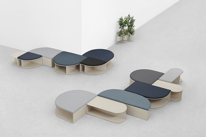 benching in different straight and semi-circular shapes in blue, green/blue, gray, dark gray, and natural wood