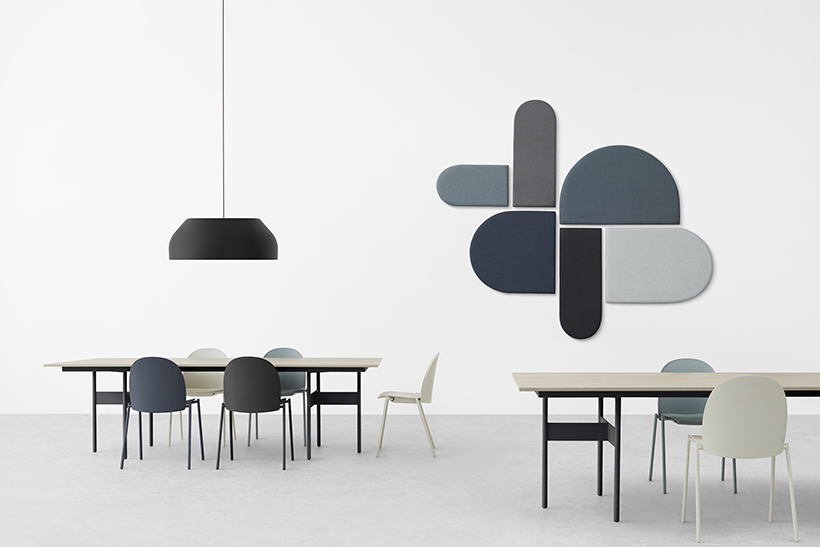 enKAK tables and chair with black pendant lamp and sound-absorbing wall panel