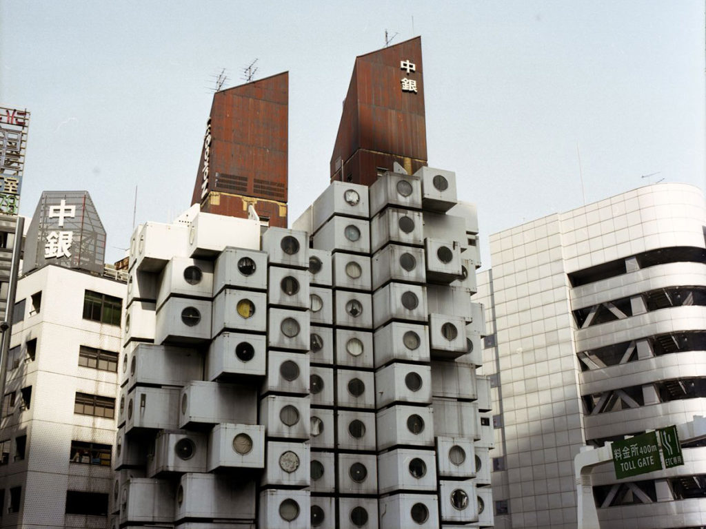 Nagakin tower in Japan with capsule like apartments stacked on top of each other