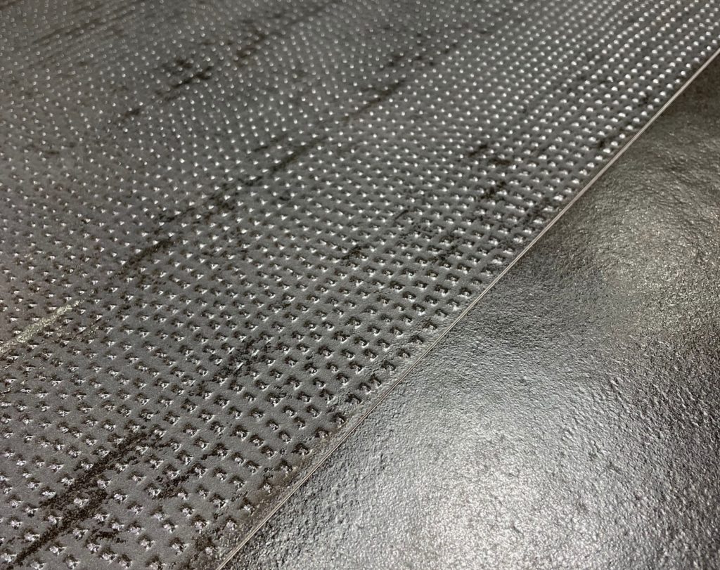 Settecento dots raised tiles resembling patterned concrete