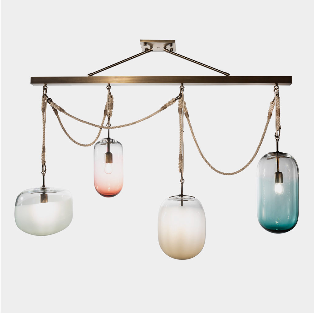 Gourd chandelier featuring four pendant lights in different colors/tints hung with hand-knotted ropes from metal bar with a brass/antique finish 