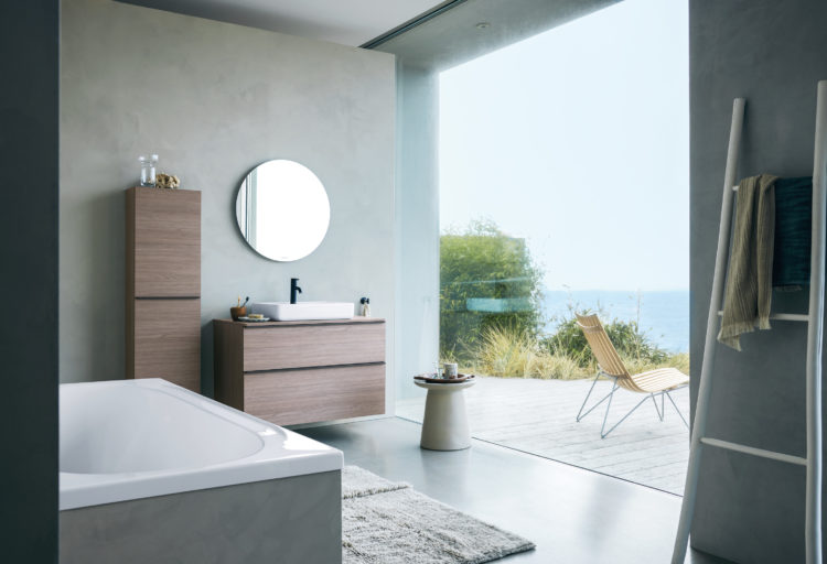 Phillippe Starch Soleil bathroom line with vanity, mirror, and tub