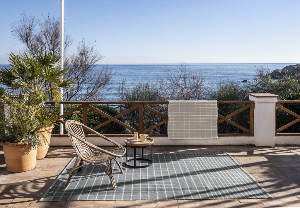 Tiles dark gray/white on patio with ocean view
