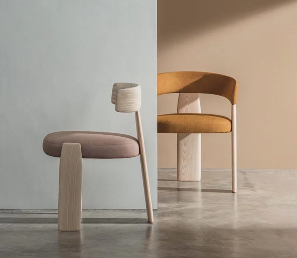 Two views Oru chair, one low chair with no armrests, a second lounge chair with upholstered back and seat