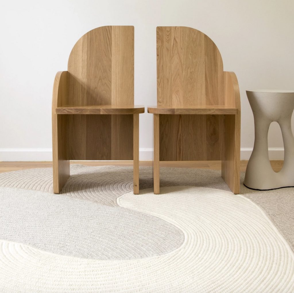 Riff rug in white, gray, light brown with twin wooden chairs 