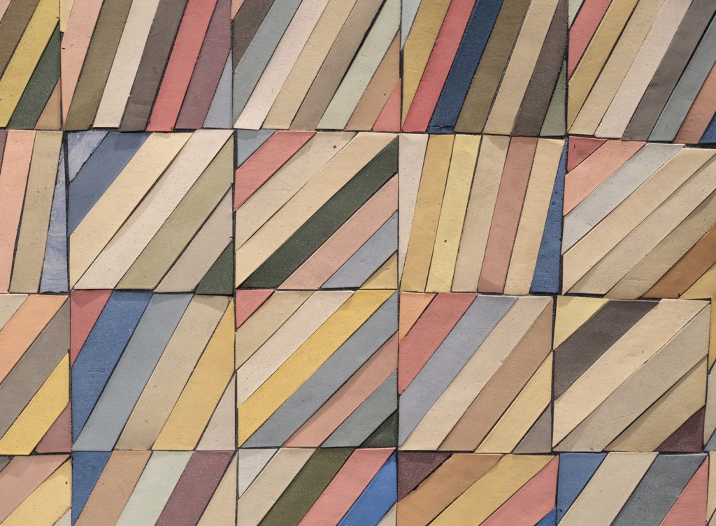 Detail of console with bars of clay, colored and assembled at varying angles