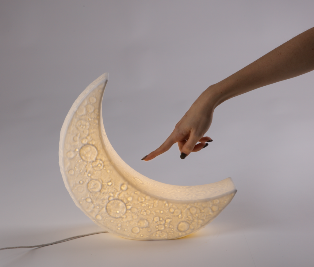 Marcantoni My Moon Table Lamp. Child-like lamp in a sickle moon shape.
