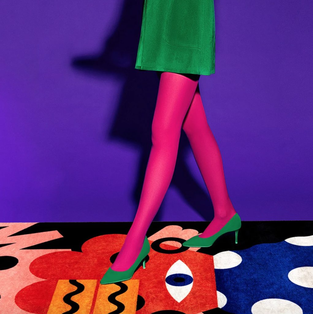Monster carpet montage with woman's legs in green high-heeled shoes 