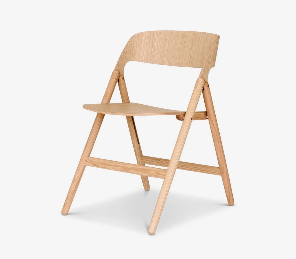 David Nari's folding chair in natural on white  background