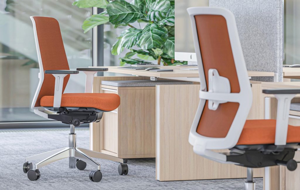 Surf chair by Narbutas with orange upholstery in open plan workspace