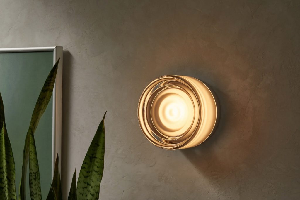 sconce with copper-colored diffuser on wall