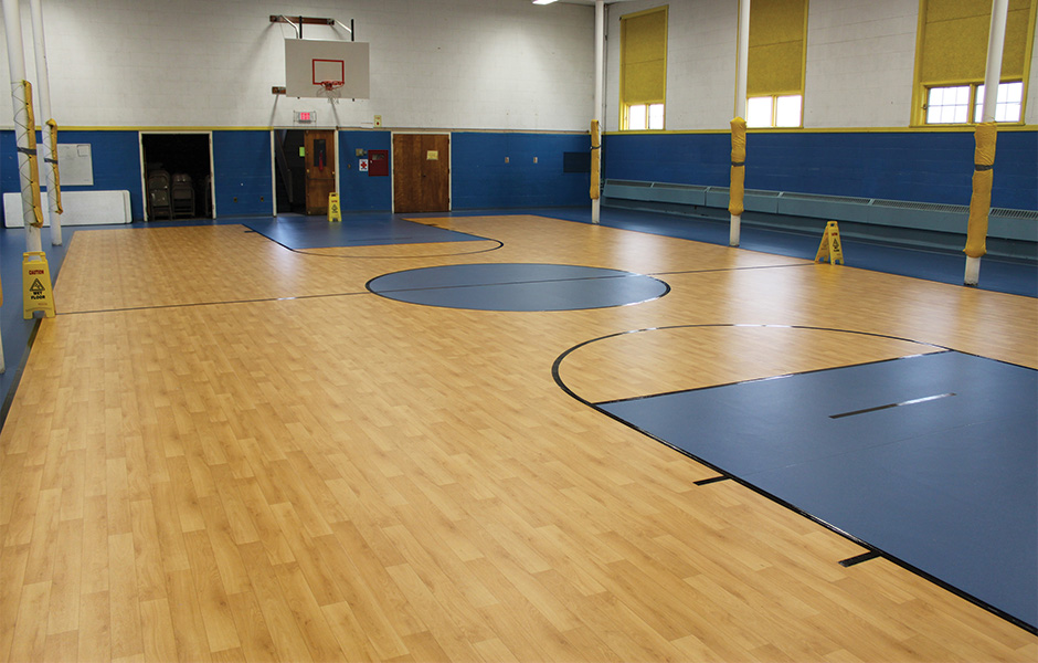 Basketball court in resilient rubber that looks like wood