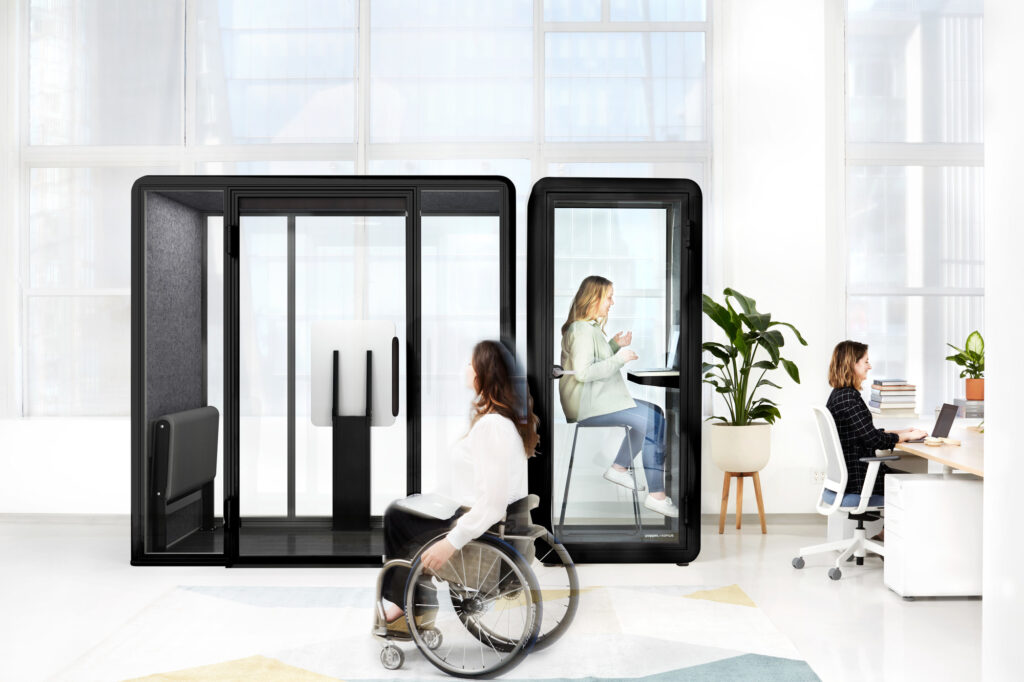 Kolo pod with black trim and Om pod with black trim side by side with woman in wheelchair in foreground