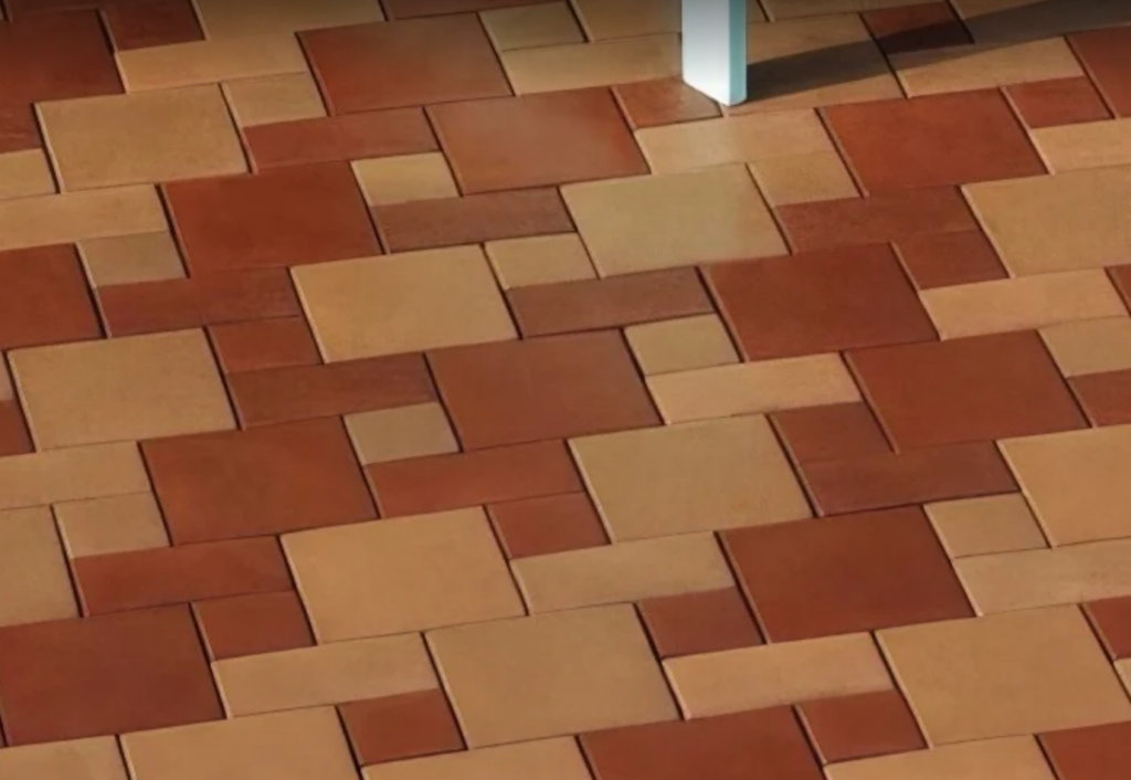 Patio detail with red and sand-colored pavers
