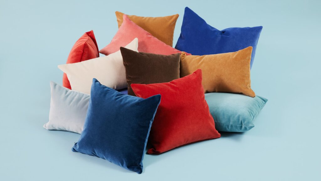Comfort Zone collection vibrant, velvet-like fabric on pillows