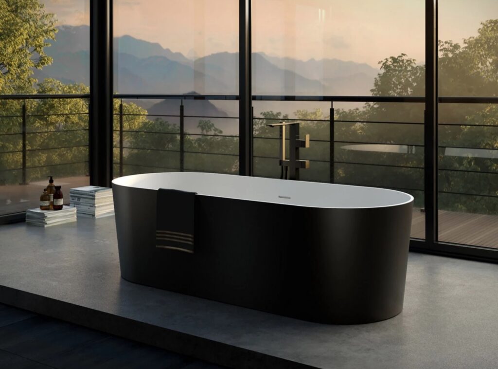 Disenia Deluxe bathtub with black matte exterior in front of window with mountain view