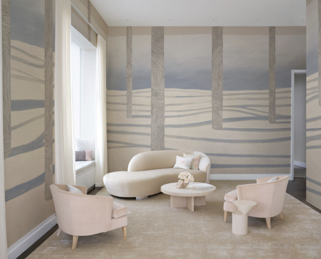 Sylvan Calico wallpaper with tall trees on an abstract forest/mountain landscape in living room with plush furniture
