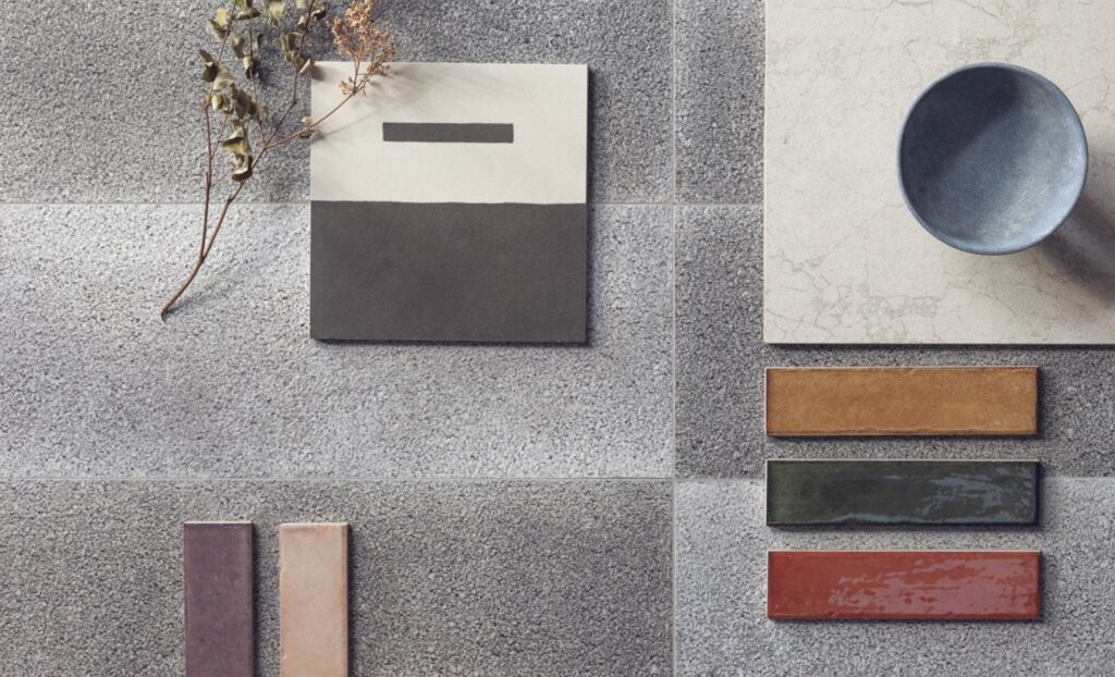 mood board with colorful rectangular samples on a rough cement palette