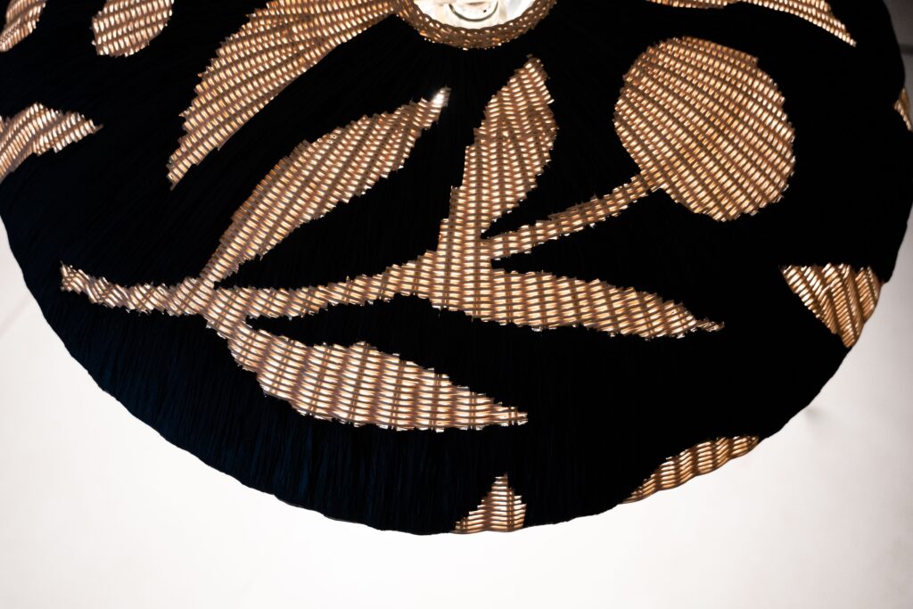 Antonym view from above showing flower-shaped design on lamp shade