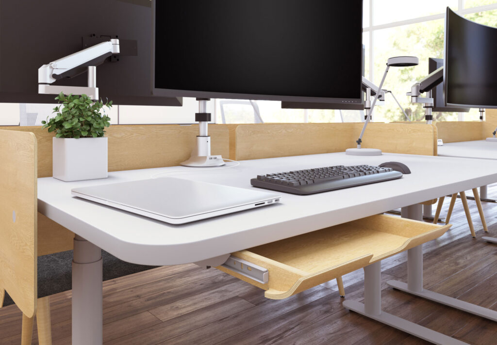 close up view of sit-stand desk with thin profile drawer