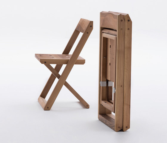 Folding chair in open and closed position