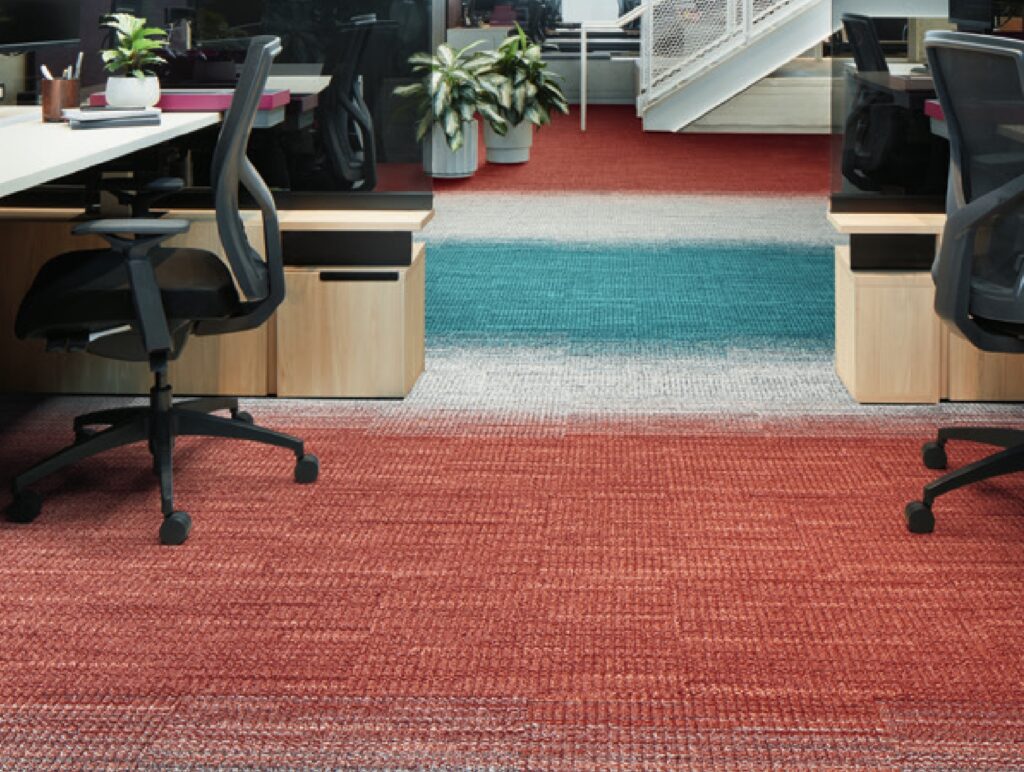 carpet tiles in gradients of red, white, gray, blue