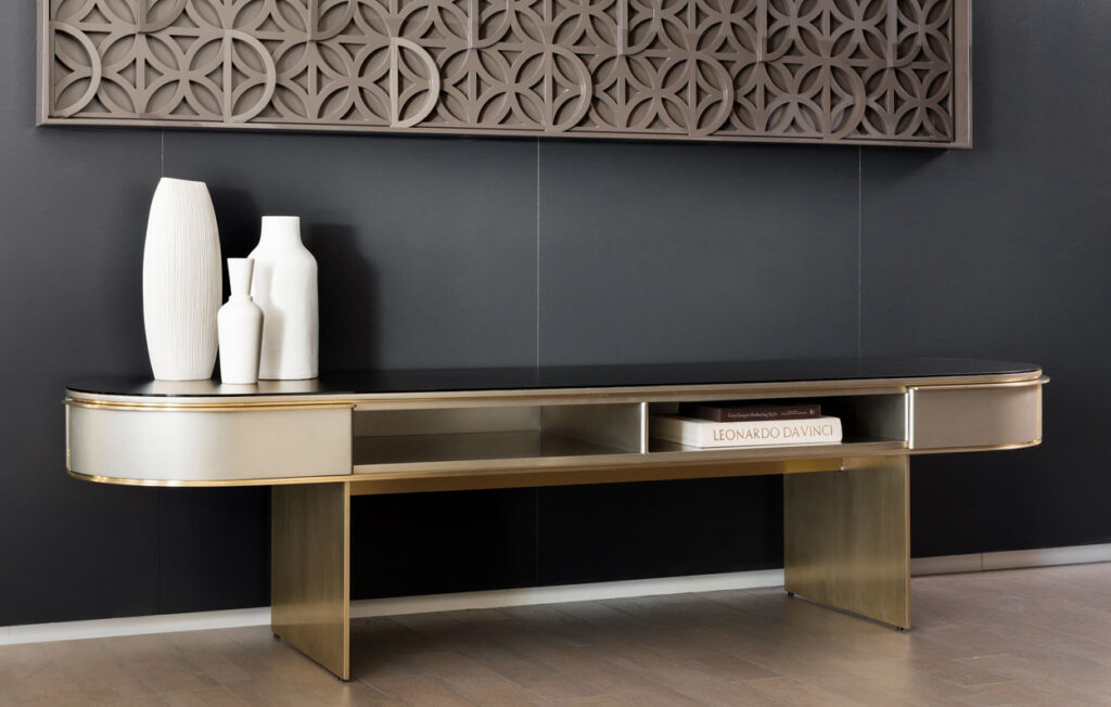 Credenza with black laminate, gold base, and pearl drawer fronts