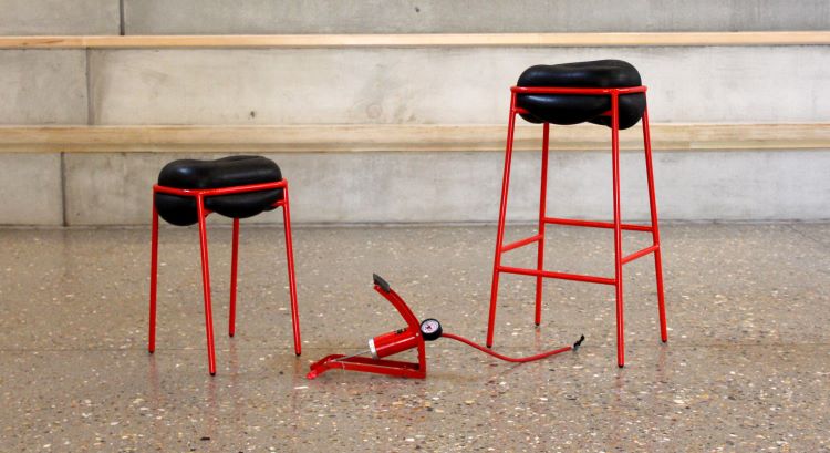 High and low stool in red with pump