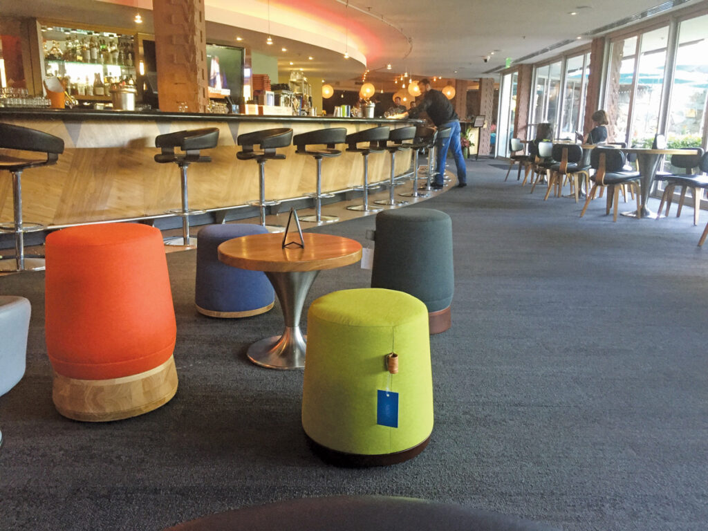 Poufs around small table in bar/restaurant