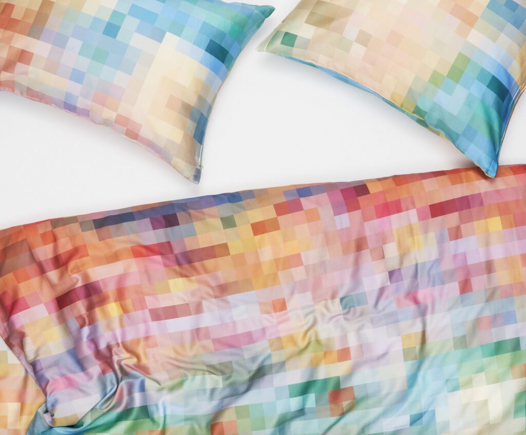 Pixellated design in many colors on bedding 