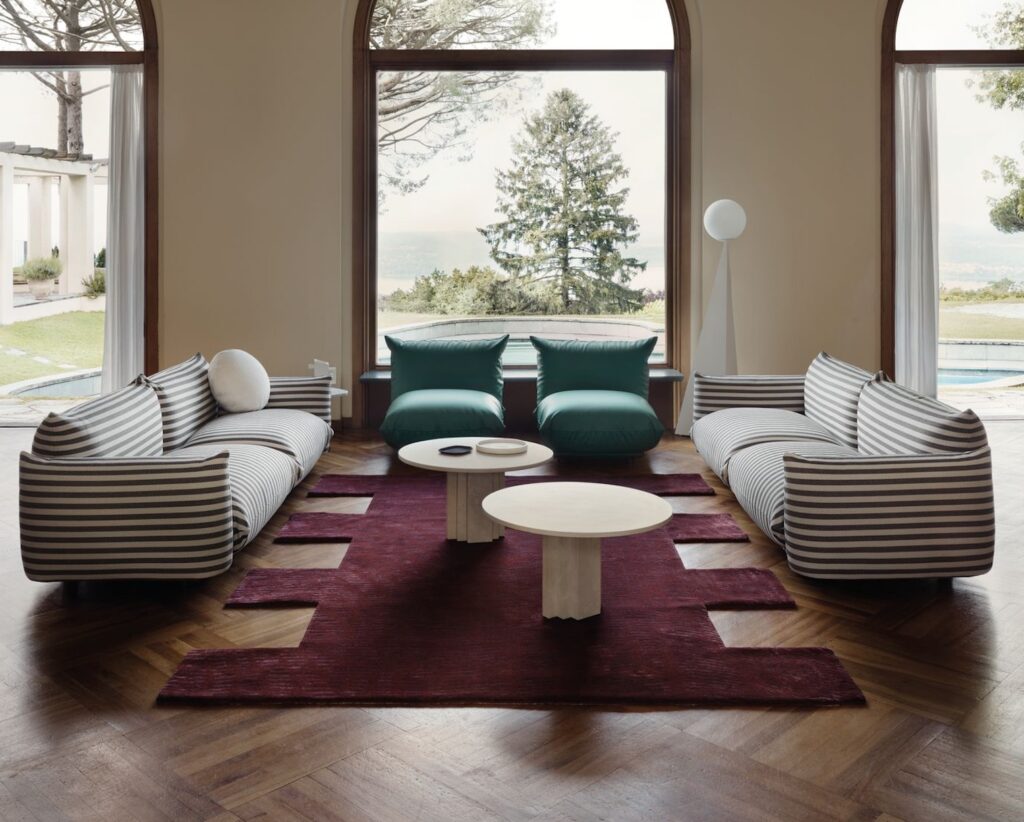 c+c tapis quadratic rug in living room in maroon