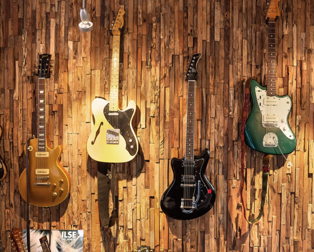 Featured wall with guitars