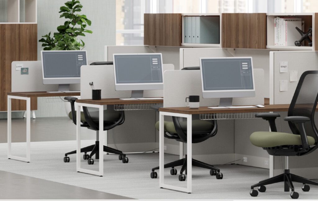 Row of desks/workstations with overhead storage