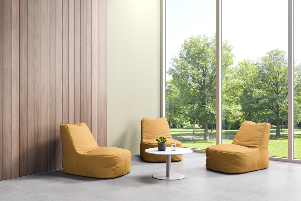 Kiwi in a mustard brown color, three chairs