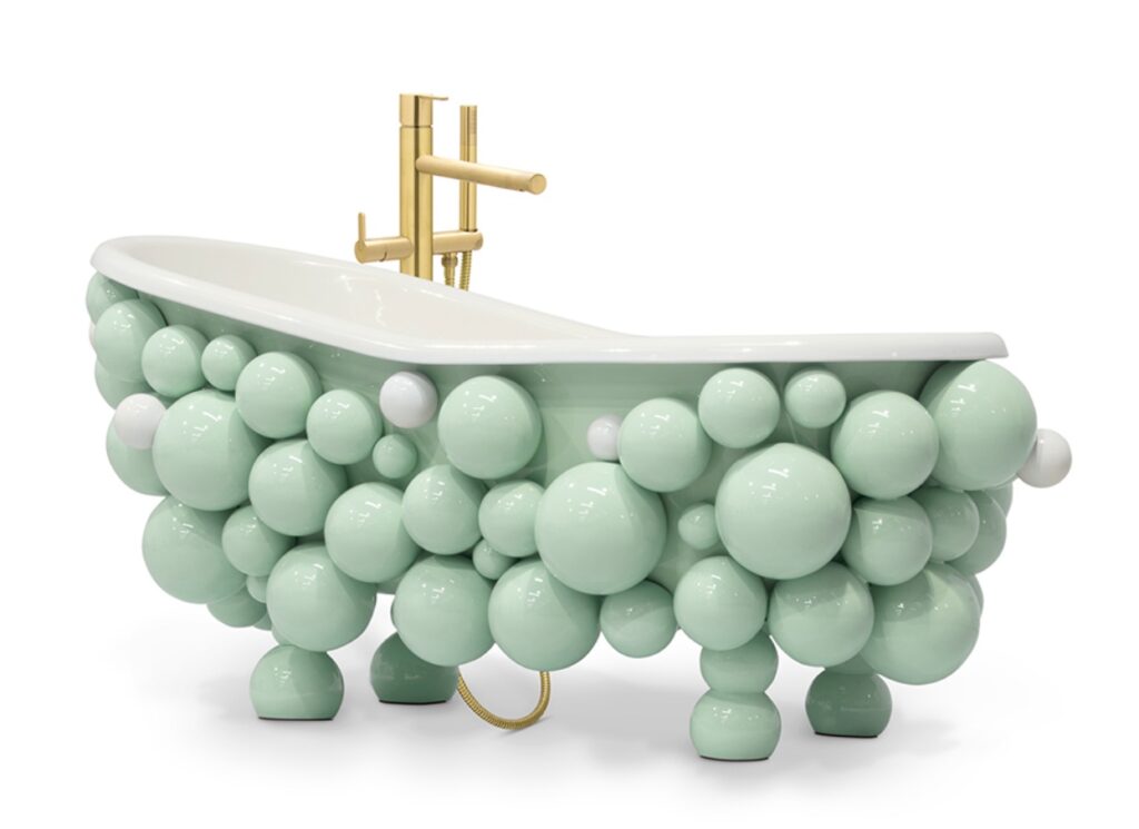 Newton bathtub with mint-colored bubbles