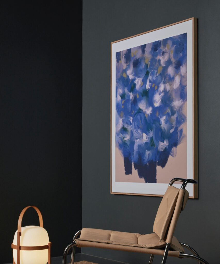 Painting featuring abstract blue flowers
