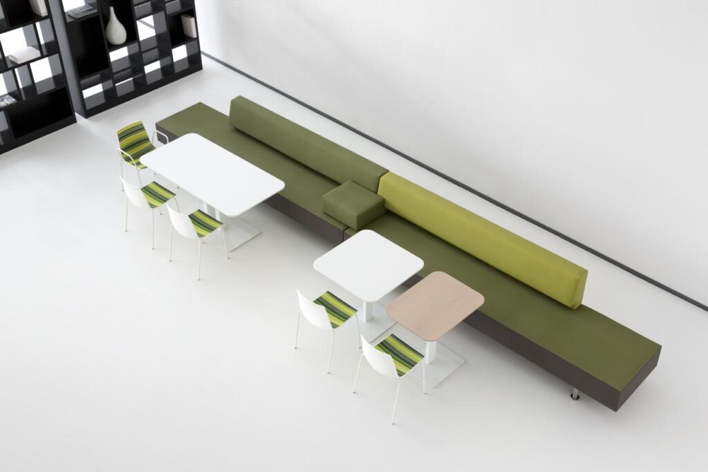 Office furniture shot from overhead with five chairs, tables, and modular sofa