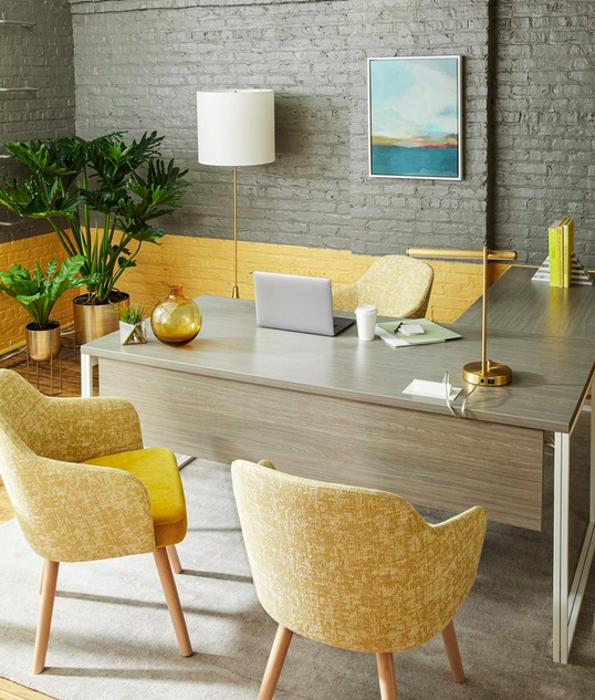 A warm and welcoming private office featuring The Greenpoint Collection