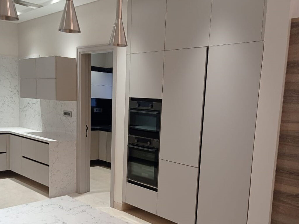 Paneluxe kitchen with fridge and oven surround