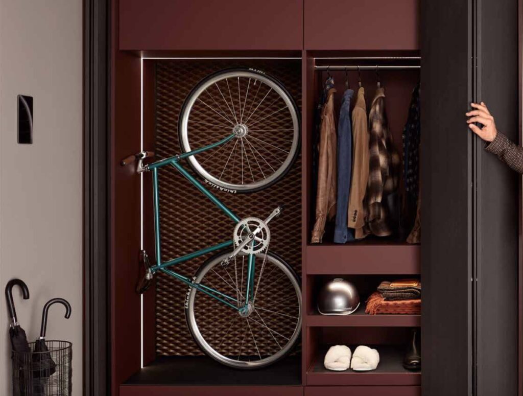 Pocket doors from KBIS bes of in open position with bicycle and clothing
