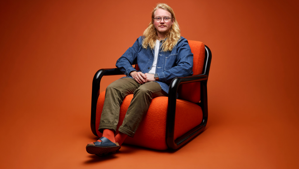 [001] Chair with person