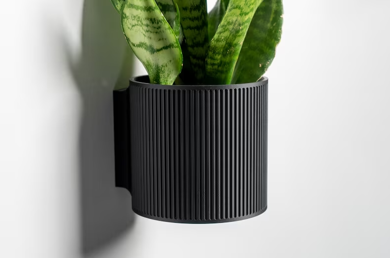 black wall planter