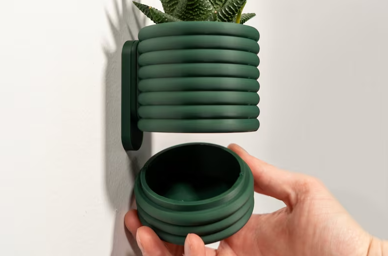 green planter with drip tray