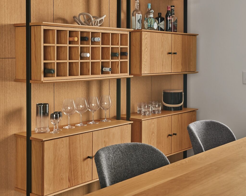 Beam storage in light-toned wood with wine rack insert/bar set-up