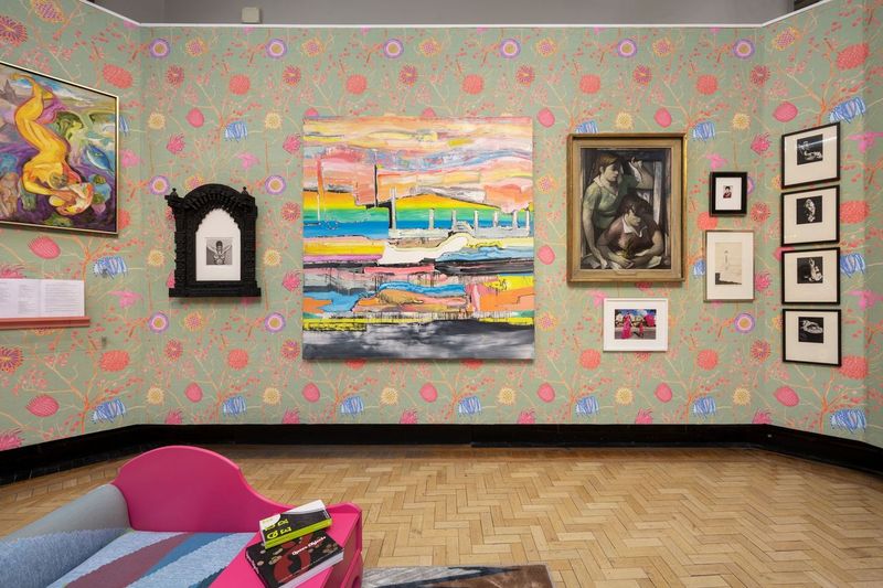 Wall with wallpaper and art at Liz Collins' Mischief exhibit
