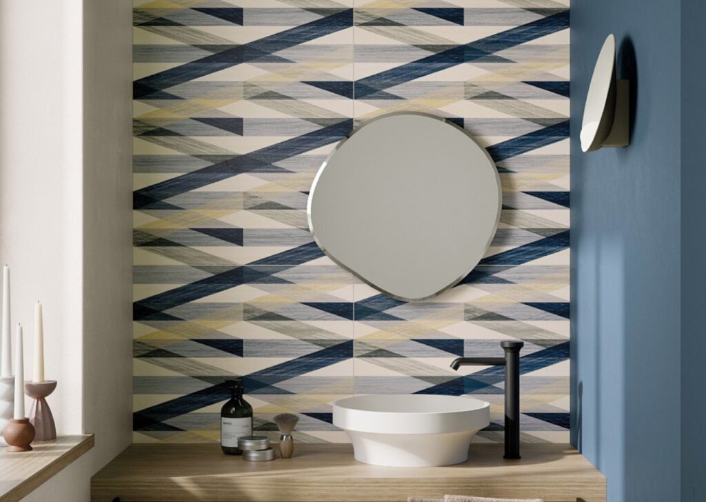 Stare collection Eforea criss-crossing lines on backsplash in bath